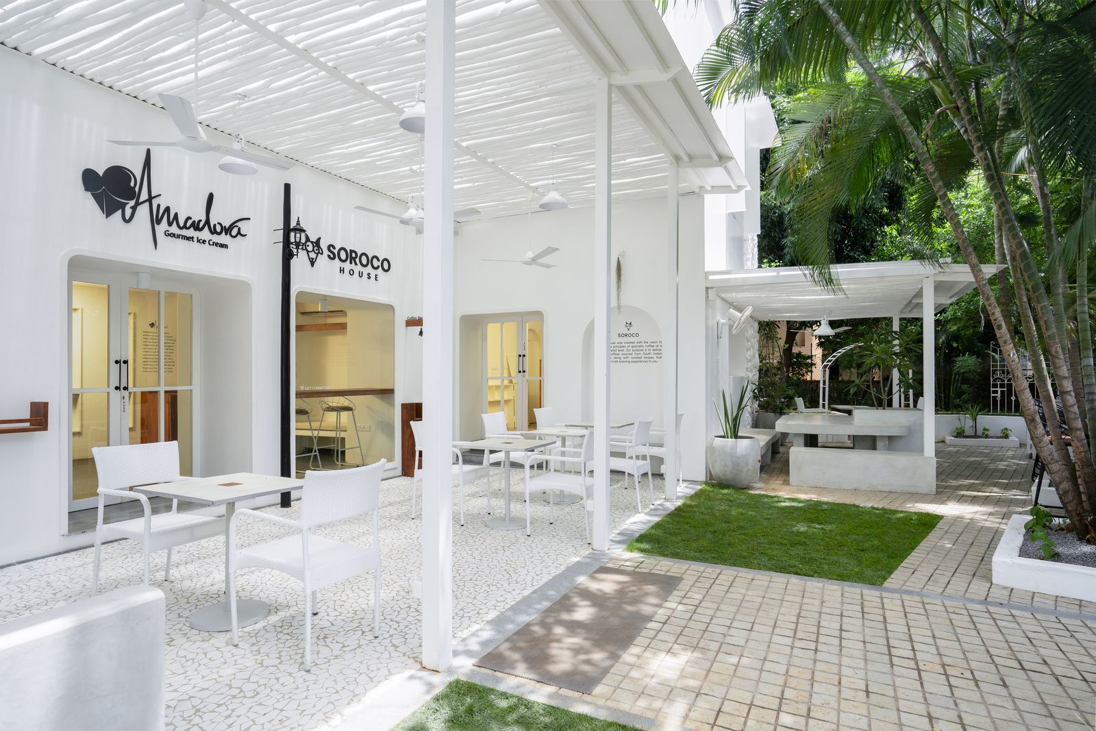 The Wallace Garden courtyard with the Amadora and Soroco House signs